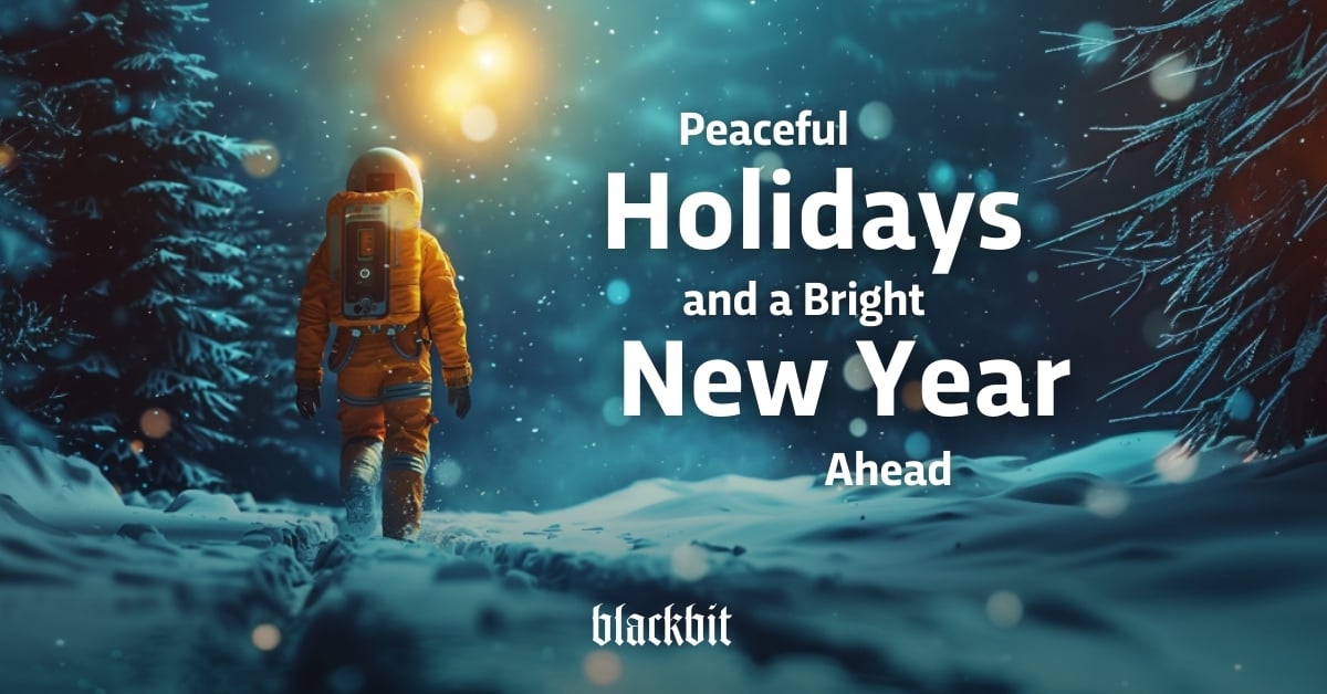 An astronaut in the snow walks under a glowing sky, accompanied by festive New Year greetings.