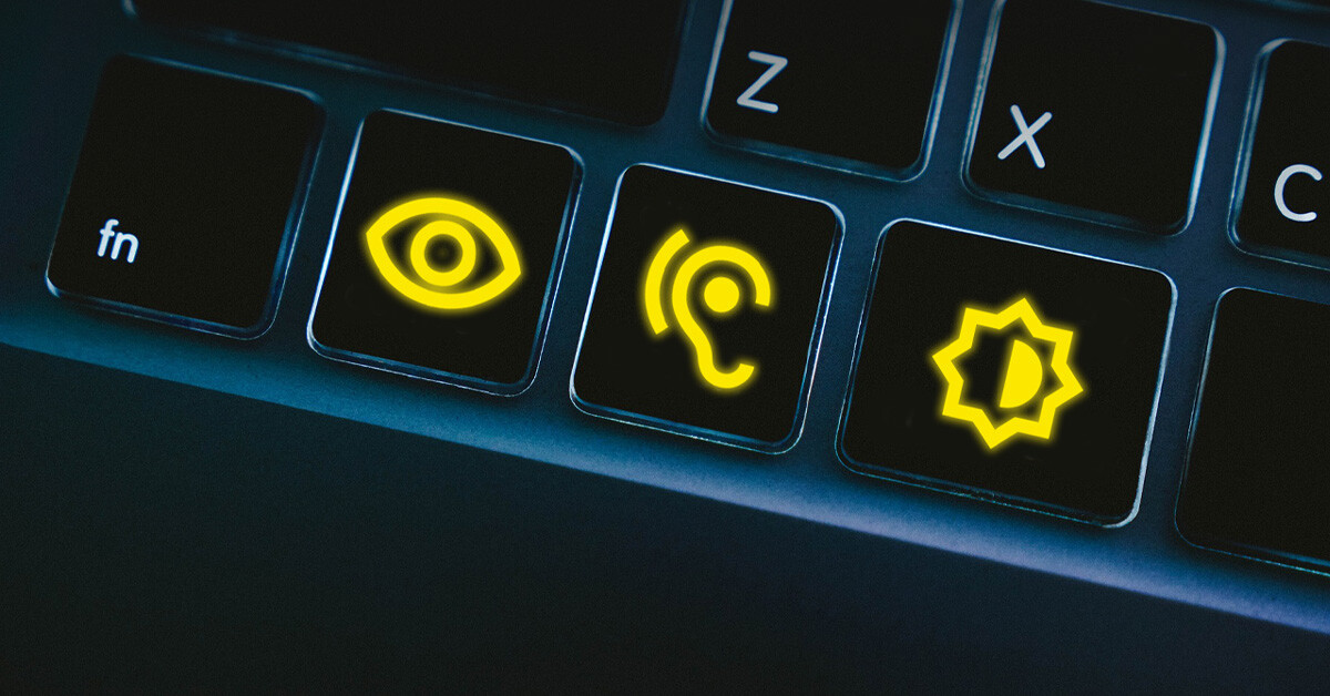 Close-up of a keyboard with yellow symbols clearly visible on the keys